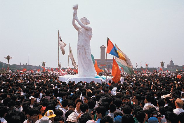 Pro-Democracy Protesters in Tiananmen Square Surround the Goddess of Democracy in May 1989